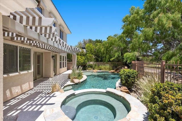 300 N Royal Ascot Dr, Las Vegas, NV 89144 - view of pool with a pool with connected hot tub, a pergola, and a fenced backyard