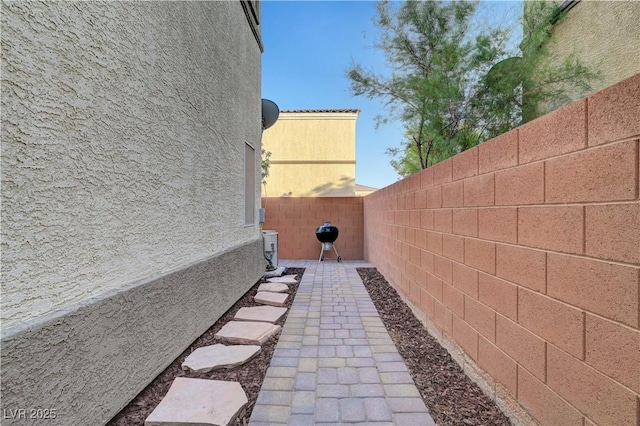 6170 E Sahara Ave Unit 1061, Las Vegas, NV 89142 - view of side of home with a fenced backyard and stucco siding