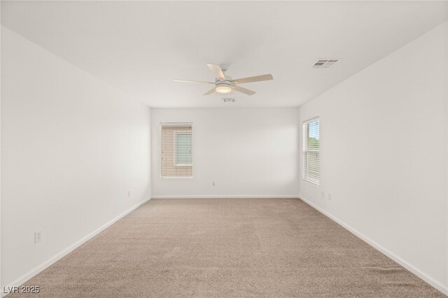 6480 Chebec St, North Las Vegas, NV 89084 - unfurnished room featuring ceiling fan and light colored carpet