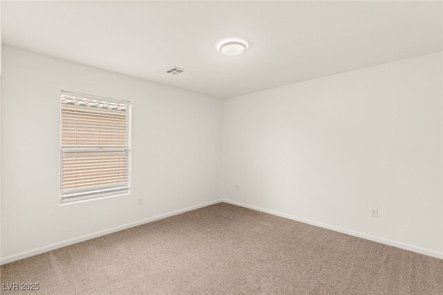 6480 Chebec St, North Las Vegas, NV 89084 - spare room featuring carpet floors and baseboards