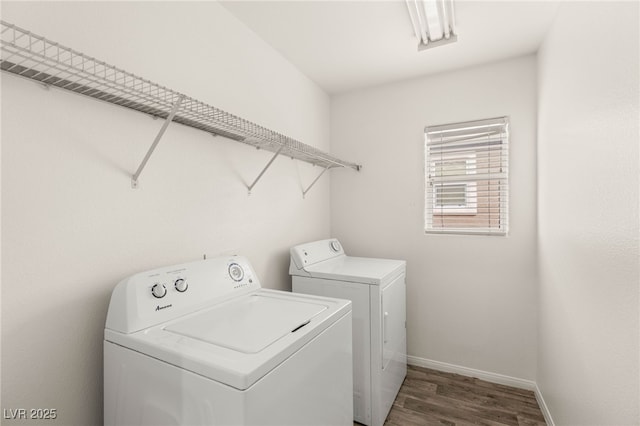 6480 Chebec St, North Las Vegas, NV 89084 - laundry room featuring washing machine and dryer and wood finished floors