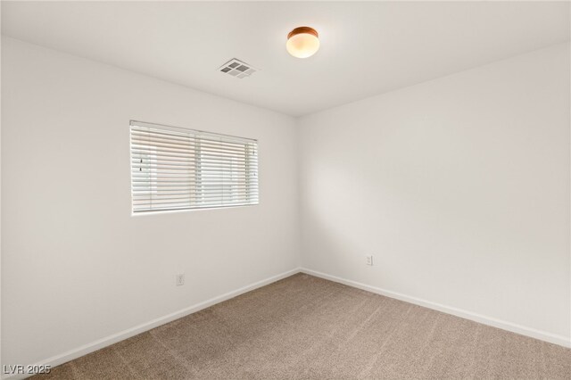 6480 Chebec St, North Las Vegas, NV 89084 - spare room featuring carpet flooring and baseboards