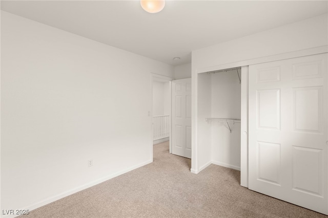 6480 Chebec St, North Las Vegas, NV 89084 - unfurnished bedroom with light colored carpet and a closet