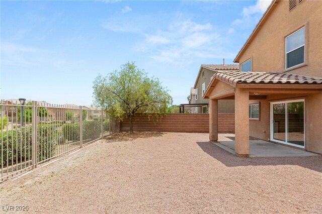 6480 Chebec St, North Las Vegas, NV 89084 - fenced backyard with a patio