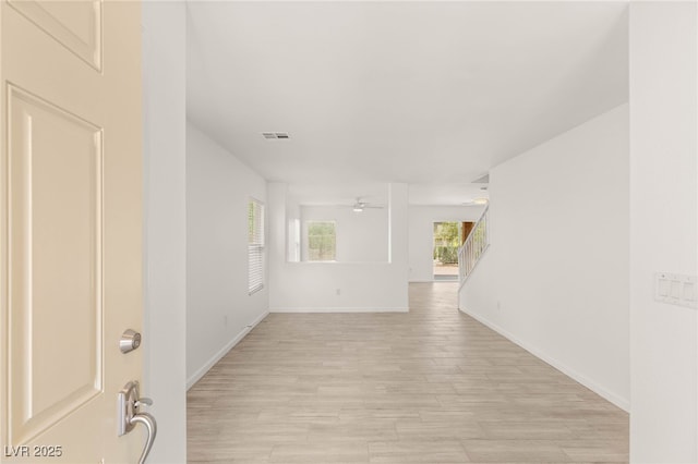 6480 Chebec St, North Las Vegas, NV 89084 - unfurnished room featuring light wood-style floors and a ceiling fan