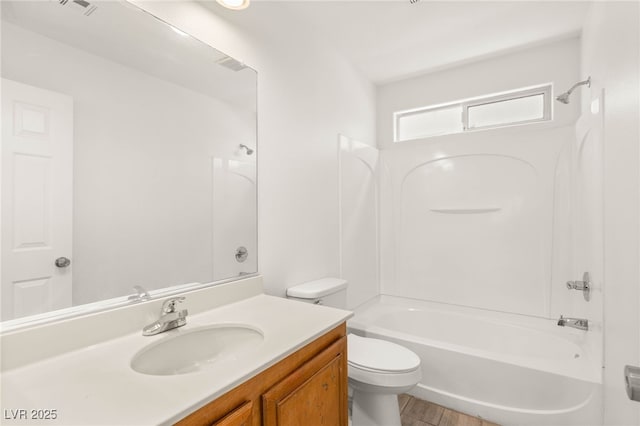 6480 Chebec St, North Las Vegas, NV 89084 - bathroom featuring vanity, tub / shower combination, and wood finished floors
