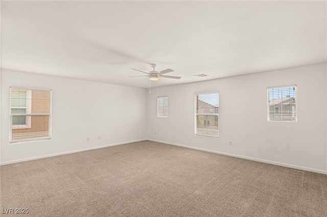 6480 Chebec St, North Las Vegas, NV 89084 - carpeted spare room featuring a ceiling fan and baseboards