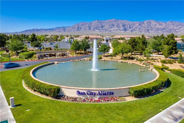6480 Chebec St, North Las Vegas, NV 89084 - surrounding community featuring a mountain view and a yard