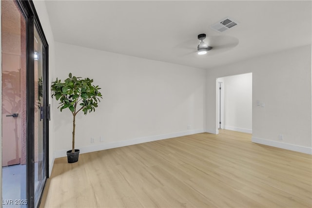 3151 Soaring Gulls Dr Unit 1179, Las Vegas, NV 89128 - spare room featuring light wood-type flooring, a ceiling fan, and baseboards