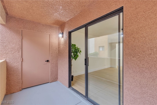 3151 Soaring Gulls Dr Unit 1179, Las Vegas, NV 89128 - doorway to property with stucco siding and a balcony