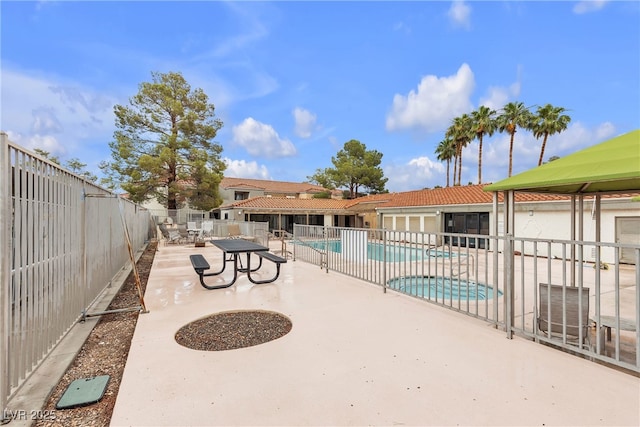 3151 Soaring Gulls Dr Unit 1179, Las Vegas, NV 89128 - community pool featuring a patio