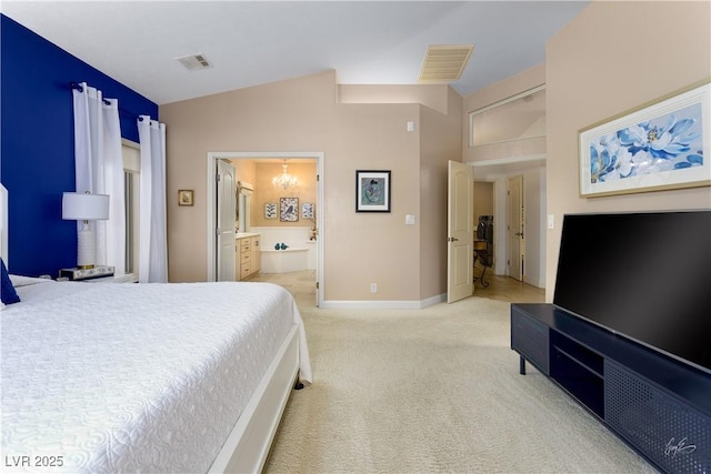 522 Via Ventana Dr, Mesquite, NV 89027 - bedroom with light carpet, a chandelier, lofted ceiling, and ensuite bathroom