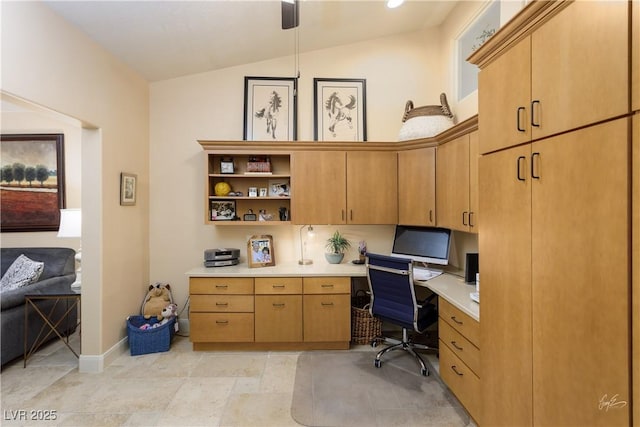 522 Via Ventana Dr, Mesquite, NV 89027 - office area featuring built in desk, lofted ceiling, and baseboards