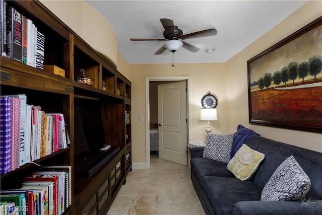 522 Via Ventana Dr, Mesquite, NV 89027 - living room featuring a ceiling fan and baseboards