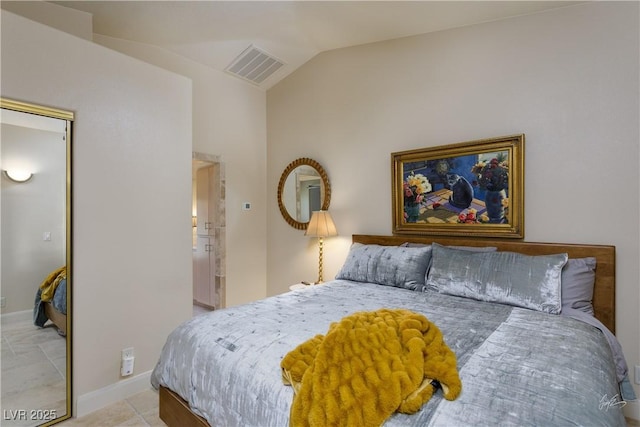 522 Via Ventana Dr, Mesquite, NV 89027 - bedroom with vaulted ceiling, tile patterned floors, baseboards, and a closet