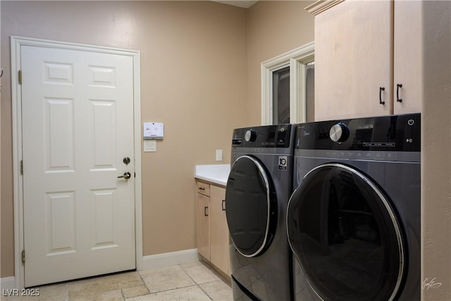 522 Via Ventana Dr, Mesquite, NV 89027 - washroom with washer and dryer, cabinet space, baseboards, and stone tile flooring