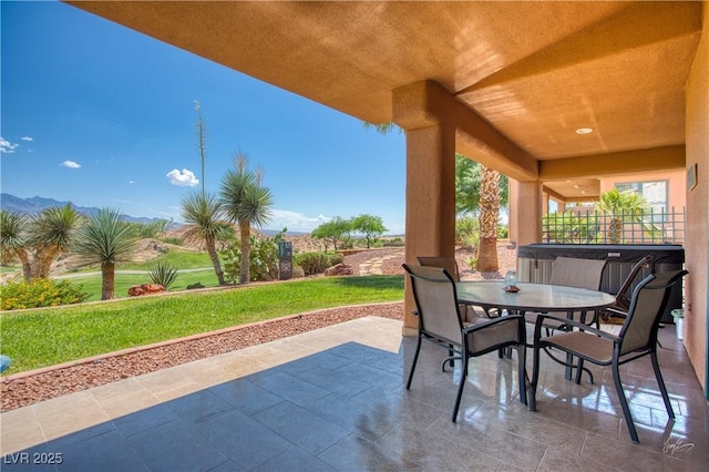 522 Via Ventana Dr, Mesquite, NV 89027 - view of patio / terrace with outdoor dining area and a hot tub