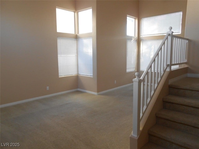 9709 Port Orange Ln, Las Vegas, NV 89134 - stairs featuring carpet flooring and baseboards