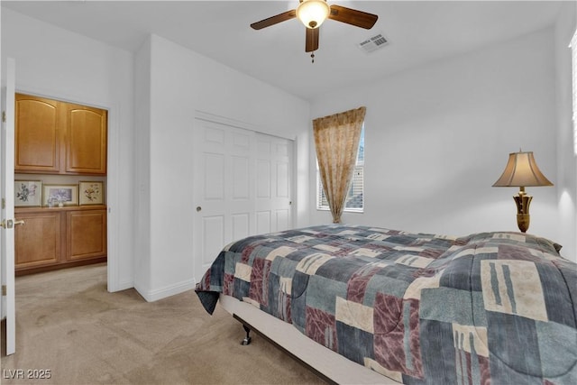 9614 Stonily Ln, Las Vegas, NV 89178 - bedroom with light colored carpet, a closet, baseboards, and ceiling fan