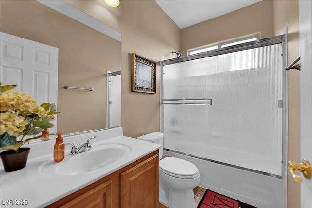 9614 Stonily Ln, Las Vegas, NV 89178 - bathroom with toilet, vanity, and combined bath / shower with glass door