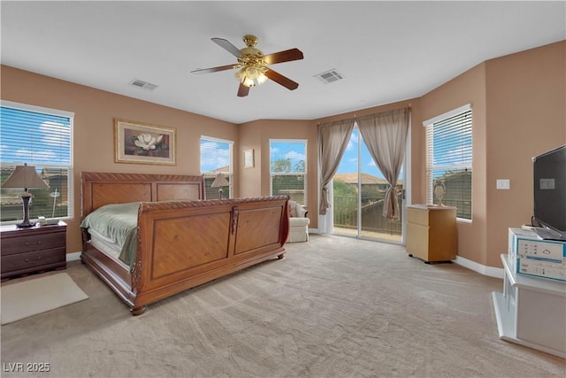 9614 Stonily Ln, Las Vegas, NV 89178 - bedroom with access to exterior, light carpet, baseboards, and ceiling fan