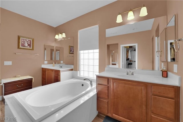 9614 Stonily Ln, Las Vegas, NV 89178 - full bath with a garden tub and two vanities