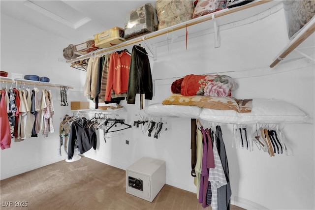9614 Stonily Ln, Las Vegas, NV 89178 - walk in closet featuring attic access and carpet floors