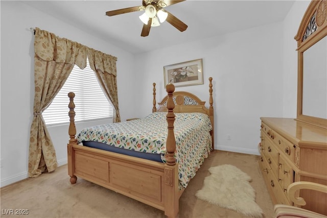 9614 Stonily Ln, Las Vegas, NV 89178 - bedroom featuring light colored carpet, baseboards, and a ceiling fan