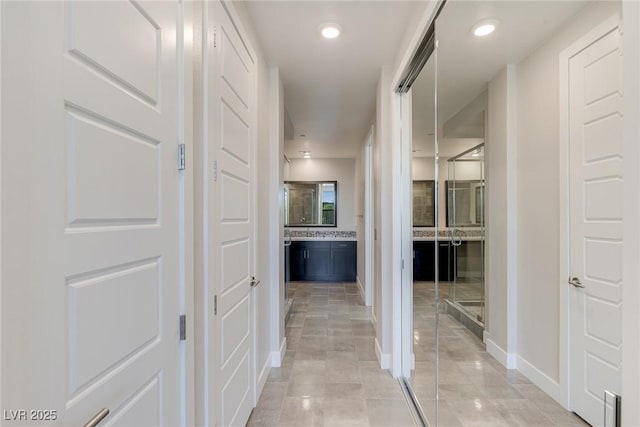 11280 Granite Ridge Dr Unit 1009, Las Vegas, NV 89135 - corridor featuring baseboards and recessed lighting