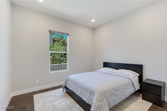 11280 Granite Ridge Dr Unit 1009, Las Vegas, NV 89135 - bedroom with dark wood-type flooring, baseboards, and recessed lighting