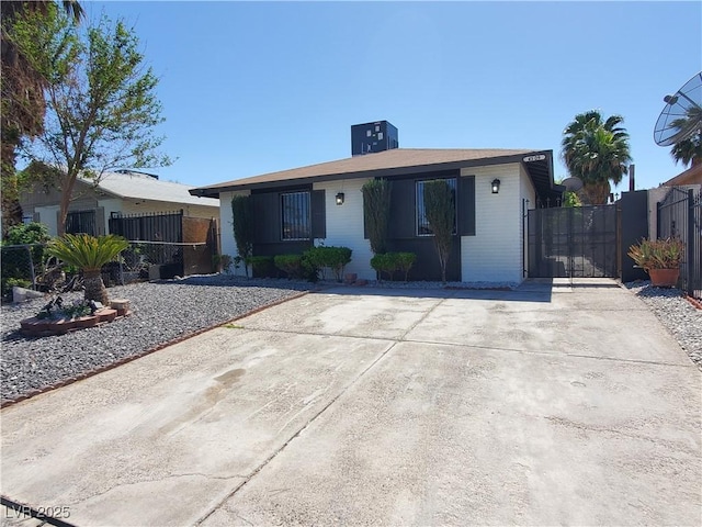 4509 Bingham Ave, Las Vegas, NV 89110 - view of front of property with a gate and brick siding