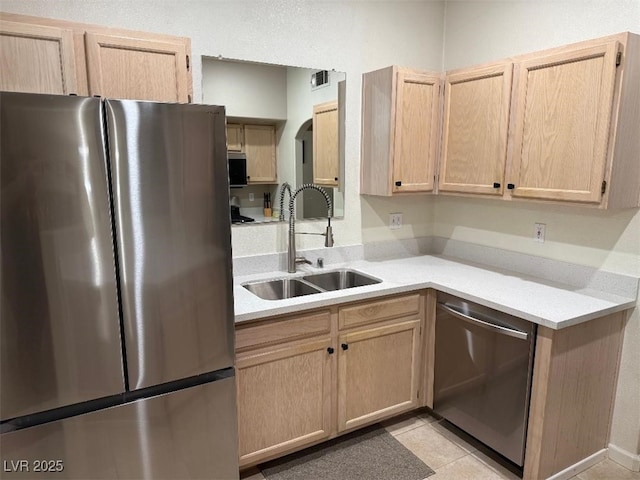 9000 Las Vegas Blvd Unit 1142, Las Vegas, NV 89123 - kitchen featuring appliances with stainless steel finishes, light brown cabinets, light countertops, and light tile patterned flooring