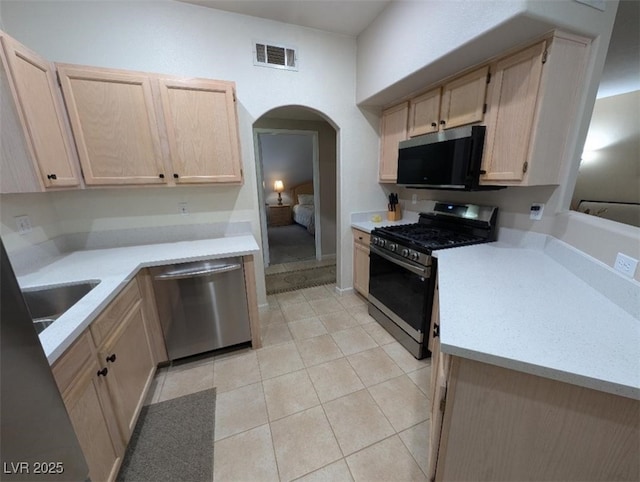 9000 Las Vegas Blvd Unit 1142, Las Vegas, NV 89123 - kitchen featuring stainless steel appliances, light brown cabinets, and light countertops