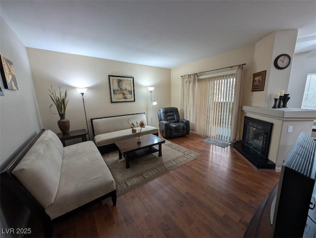 9000 Las Vegas Blvd Unit 1142, Las Vegas, NV 89123 - living area featuring wood finished floors and a glass covered fireplace