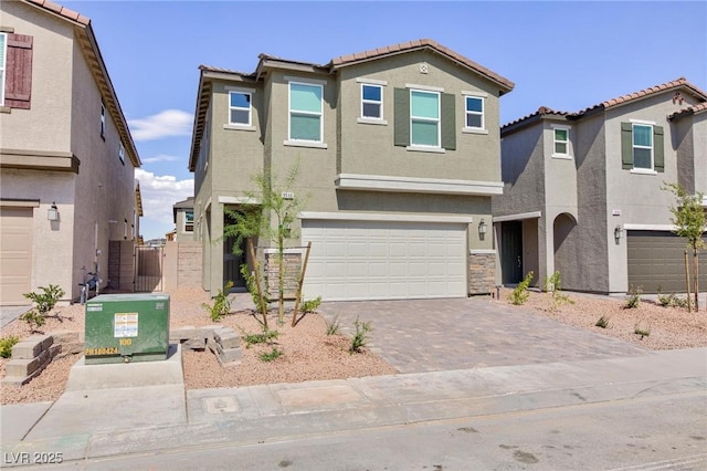 9086 Nostrand Ave, Las Vegas, NV 89148 - view of front facade featuring stucco siding, a tiled roof, driveway, and an attached garage
