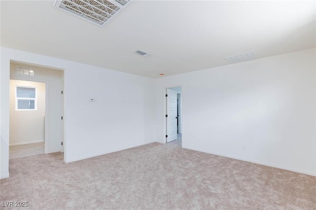 9086 Nostrand Ave, Las Vegas, NV 89148 - spare room featuring light carpet and baseboards