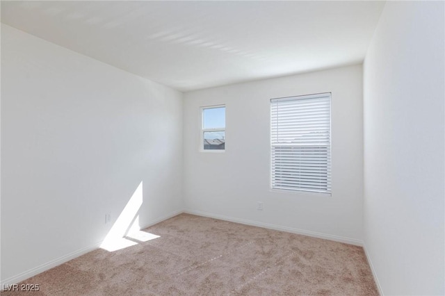 9086 Nostrand Ave, Las Vegas, NV 89148 - unfurnished room featuring light colored carpet and baseboards