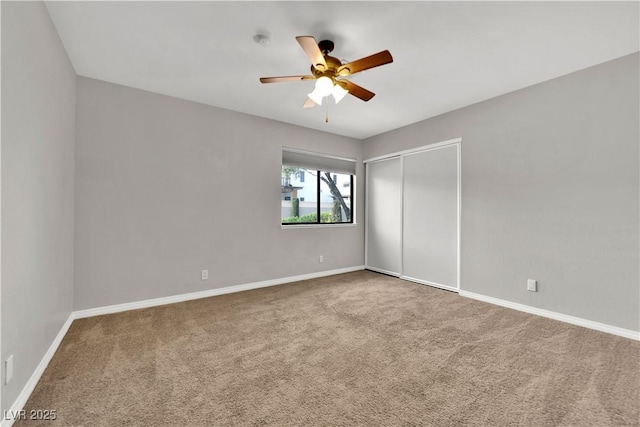 2714 Bridgepointe Dr, Las Vegas, NV 89121 - unfurnished bedroom featuring carpet flooring, a closet, baseboards, and ceiling fan