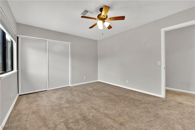 2714 Bridgepointe Dr, Las Vegas, NV 89121 - unfurnished bedroom with carpet floors, a closet, and baseboards