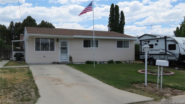 18 Connors Ct, Ely, NV 89301 - ranch-style house with a front lawn and driveway