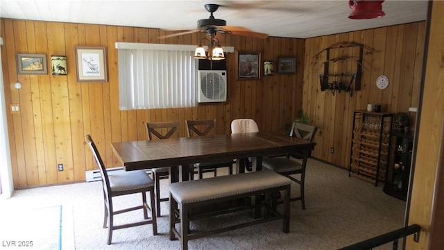 18 Connors Ct, Ely, NV 89301 - carpeted dining space featuring a ceiling fan and wood walls