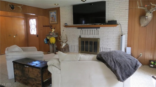 18 Connors Ct, Ely, NV 89301 - living room featuring wood walls and a brick fireplace