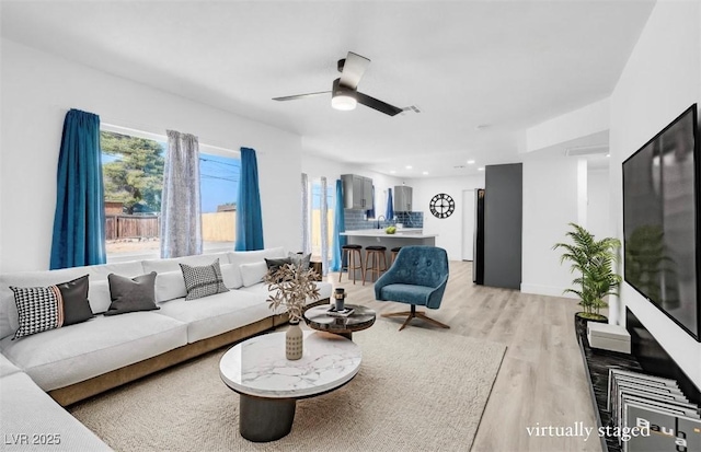 1411 Norman Ave, Las Vegas, NV 89104 - living area with light wood-style flooring, a ceiling fan, and recessed lighting