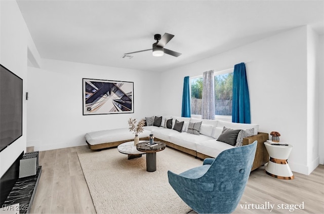 1411 Norman Ave, Las Vegas, NV 89104 - living area with wood finished floors and a ceiling fan