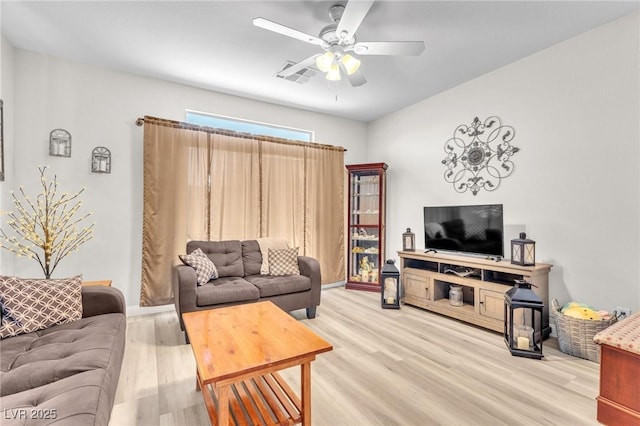 1011 Dancing Vines Ave, Las Vegas, NV 89183 - living room featuring a ceiling fan and light wood finished floors