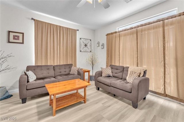 1011 Dancing Vines Ave, Las Vegas, NV 89183 - living area featuring light wood-type flooring and a ceiling fan