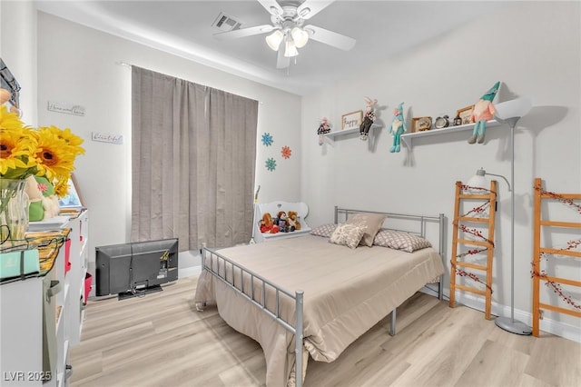 1011 Dancing Vines Ave, Las Vegas, NV 89183 - bedroom featuring light wood finished floors and ceiling fan