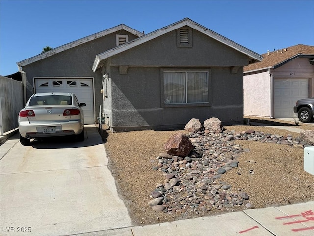 6766 Sebring St, Las Vegas, NV 89103 - single story home featuring a garage, concrete driveway, and stucco siding