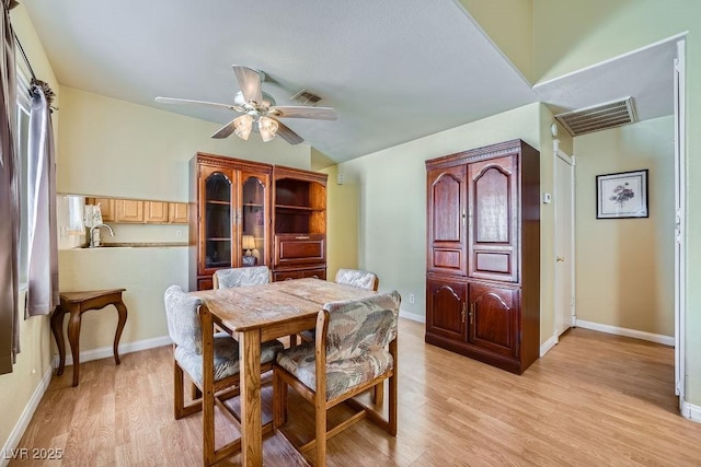 6766 Sebring St, Las Vegas, NV 89103 - dining space featuring light wood-style floors, a ceiling fan, and lofted ceiling