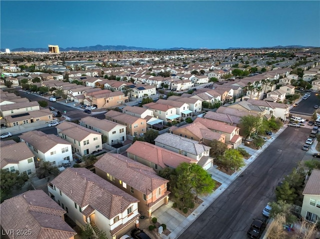 6546 American Flower St, Las Vegas, NV 89148 - aerial perspective of suburban area featuring mountains
